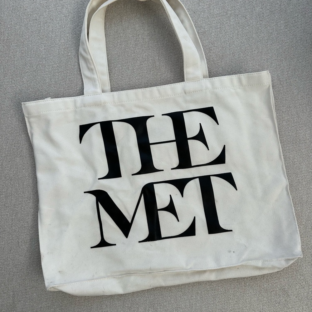 The Met Canvas Tote Bag in Off-White with Black Logo